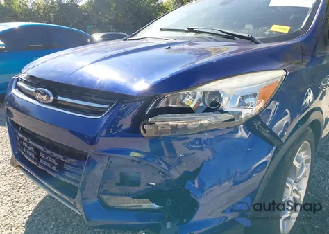 2014 Ford Escape Titanium from USA, damaged, VIN 1FMCU9J90EUD57029